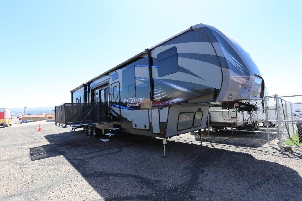 A large rv parked in the parking lot.